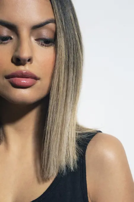 Close up fashion portrait of confident Hispanic woman.