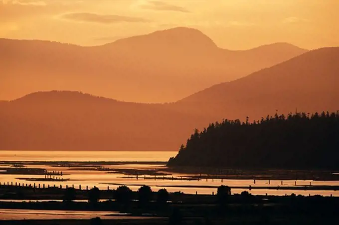 Lake with mountain range in the background, British Columbia, Canada