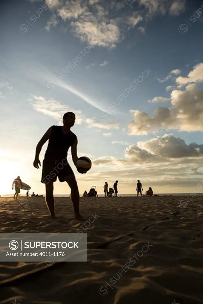 Man playing beach volleyball on the beach, Costa Rica