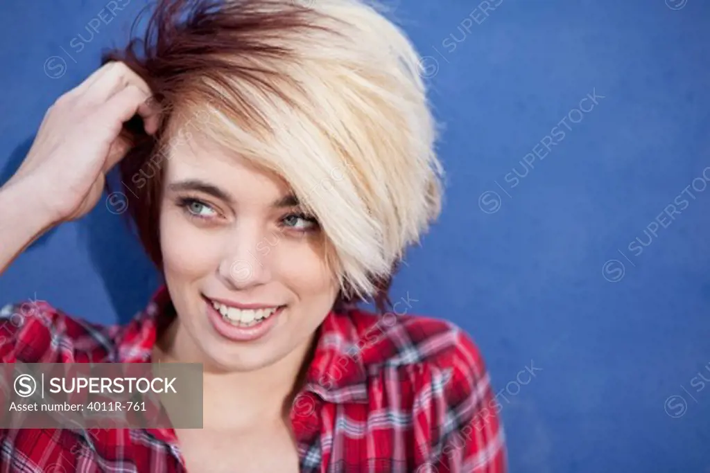 Portrait of teenage girl wearing lumberjack shirt