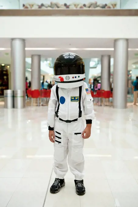 Boy in astronaut costume