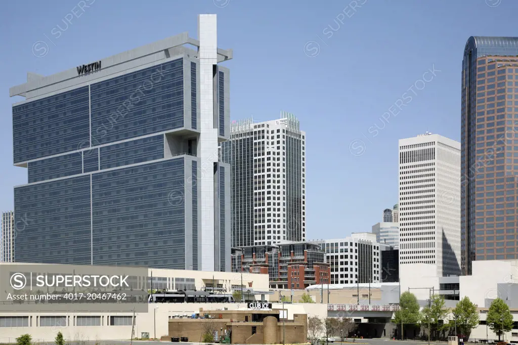 Westin Hotel with LYNX light rail train in Uptown Charlotte