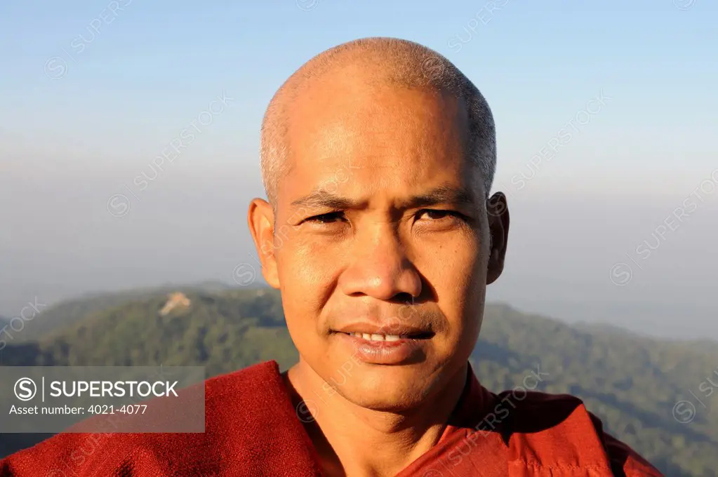 Portrait of a tribal pilgrim at pagoda on the golden rock, Kyaiktiyo Pagoda, Kyaikto, Mon State, Myanmar