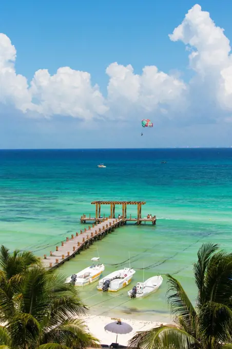 Mexico, Quintana Roo, Playa del Carmen, Pier at beach jutting out to sea at Playa del Carmen