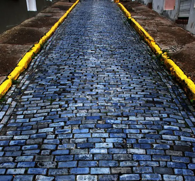 Cobblestones from ship's ballast and/or Cannon Balls give the streets of Old San Juan it's blue color.