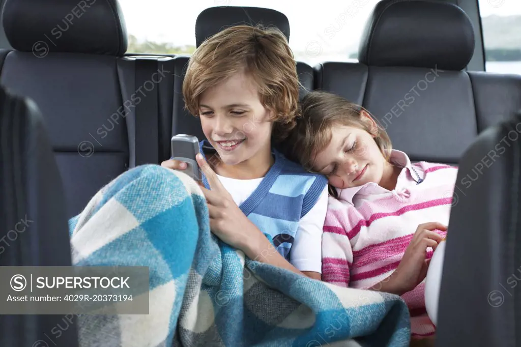 Kids in the back of a car