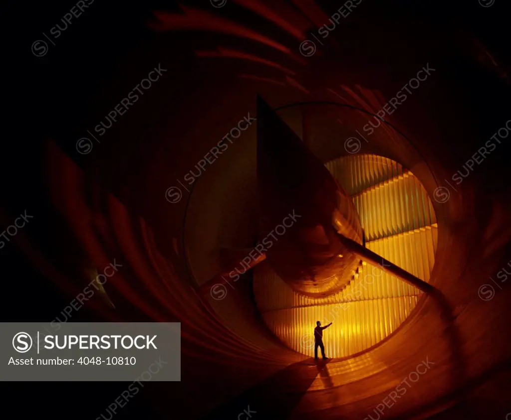 A NASA technician is drafted by the doors of the Transonic Wind Tunnel at NASA Langley Research Center, Hampton, Virginia. 1996.