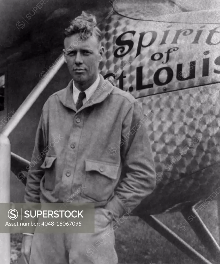 Charles Lindbergh, at Le Bourget Airport, Paris, next to Spirit of St. Louis, May 31, 1927. On May 20-21, 1927, he completed the first non-stop flight between New York and Paris  (BSLOC_2020_2_68)