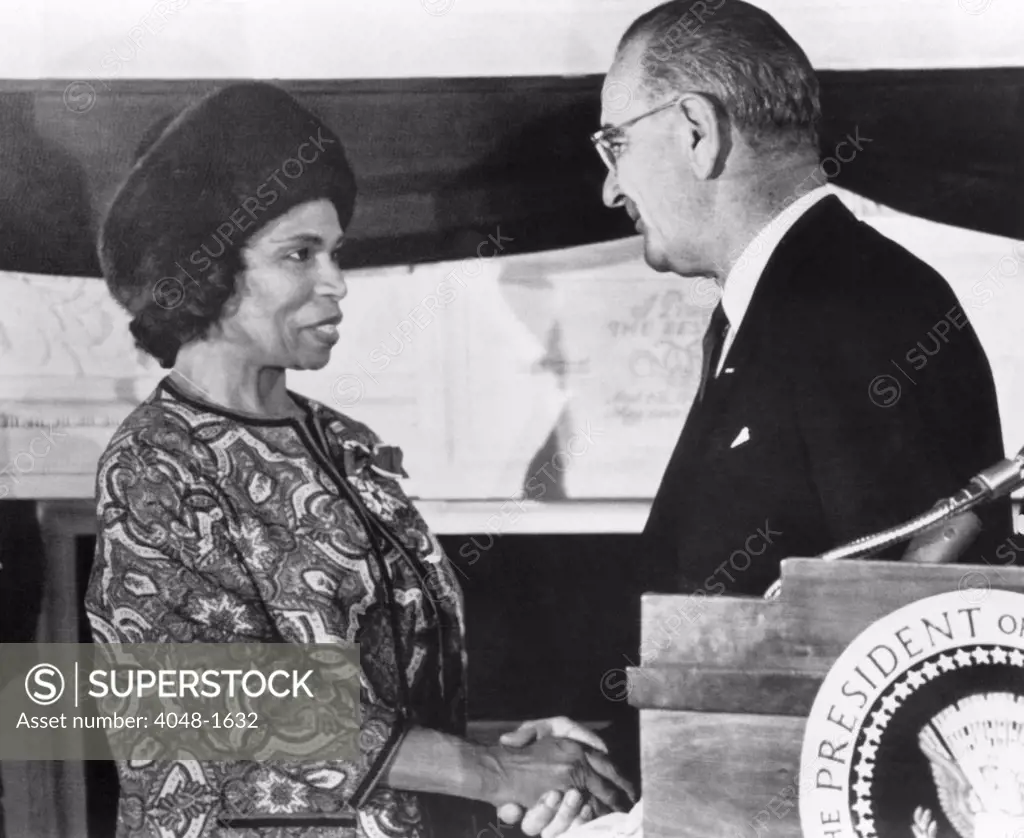 Marian Anderson is congratulated by President Lyndon B. Johnson at the White House during the presentation of the Presidential Medal of Freedom, 1965