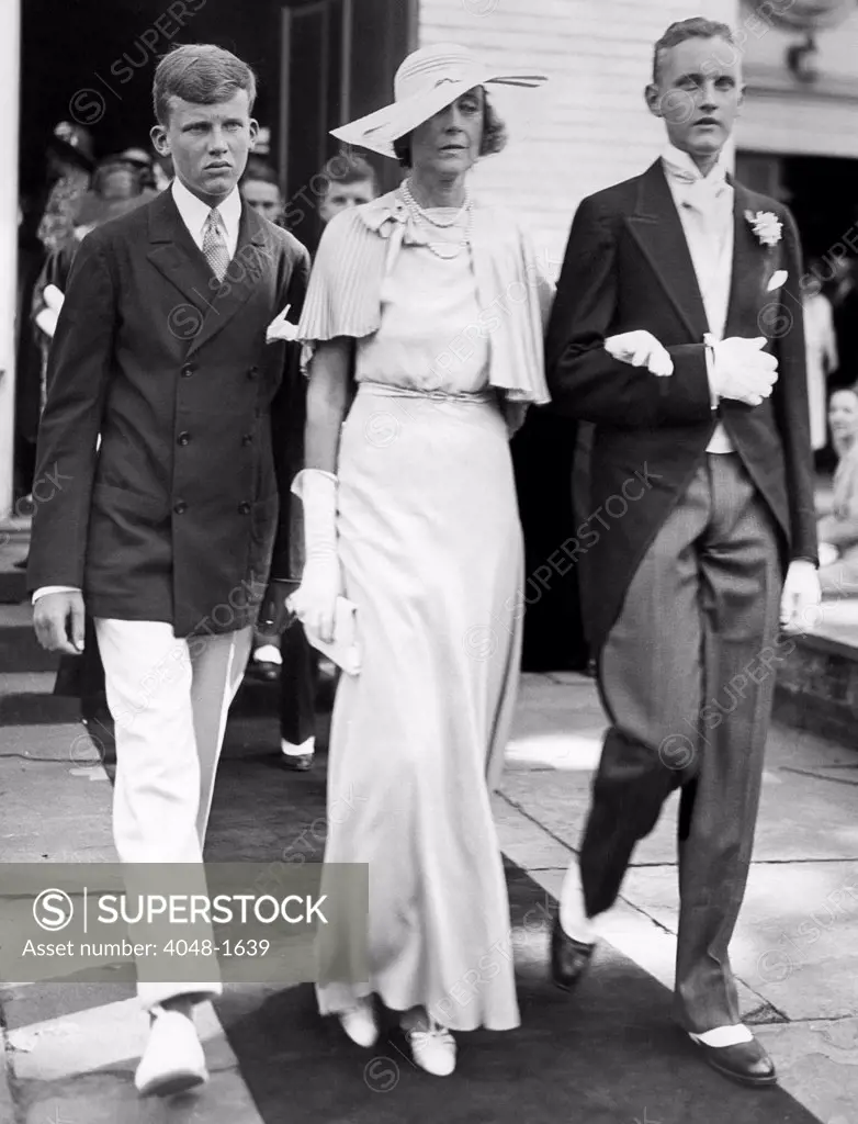 Madeleine Fiermonte (formerly Astor) with her two sons William Dick and John Dick at the wedding of her son John Jacob Astor VI, 1934