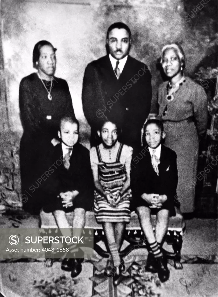 MARTIN LUTHER KING,Jr. appears(front row, right) in an early photo with his family. From L to R: Alberta Williams King (mother), Martin Luther King, Sr. (father), Jennie Williams (grandmother), brother Alfred Daniel, and sister Christine. Year unknown.