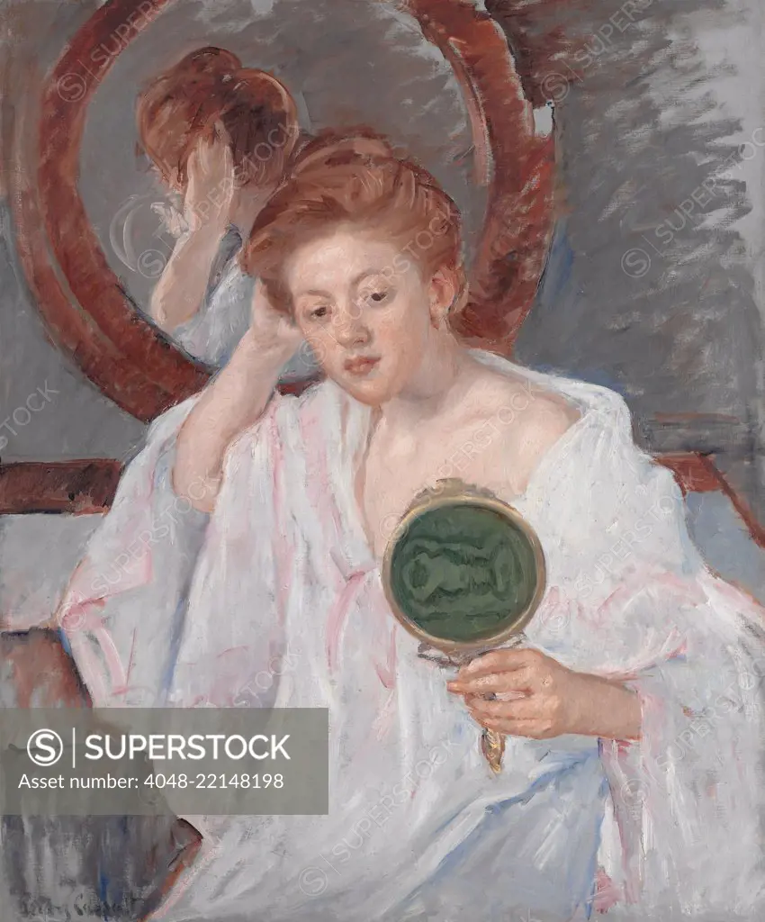 Denise at Her Dressing Table, by Mary Cassatt, 1908-9, French impressionist painting, oil on canvas. An auburn-haired young woman examines her hairdo with two mirrors in a painterly composition of warm browns, pinks and rich grays (BSLOC_2017_3_146)