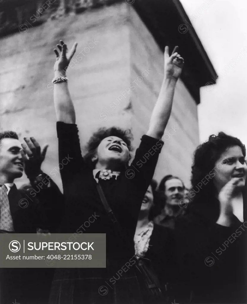 Parisian woman cheers at liberation celebration. August 29, 1944. World War 2. (BSLOC_2014_10_262)