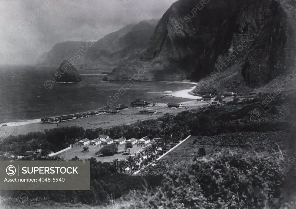 Leper Colony. The Kalawao Settlement, on the small Hawaiian island of Molokai, was established in 1866 as the first isolation settlement for Lepers. View of the Photo shows a circa 1900 view of the colony, showing buildings, ocean, and mountains. Kalawao is now part of Kalaupapa National Historic Park.