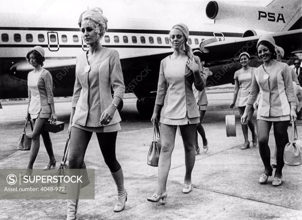 January 8, 1972-- Miami, FLA-- Stewardesses who were aboard the Pacific Northwest Airlines Boeing 727 which was hijacked on a flight from San Francisco to Los Angeles January 8, and forced to fly to Cuba after a fuel stop in Tampa, are shown as they leave the plane as they arrived in Miami January 7.