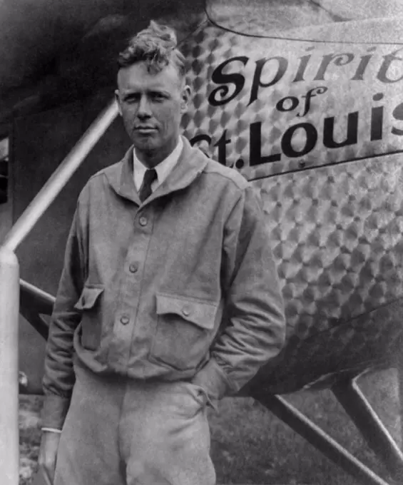 Charles Lindbergh, at Le Bourget Airport, Paris, next to Spirit of St. Louis, May 31, 1927. On May 20-21, 1927, he completed the first non-stop flight between New York and Paris  (BSLOC_2020_2_68)