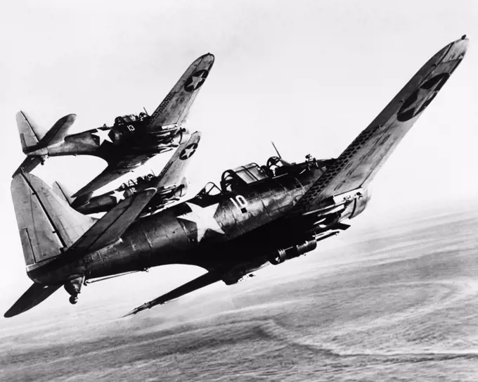 Three U.S. Navy Dauntless dive bombers on a fighting mission in the Pacific, on a fighting mission in the Pacific. 1943.