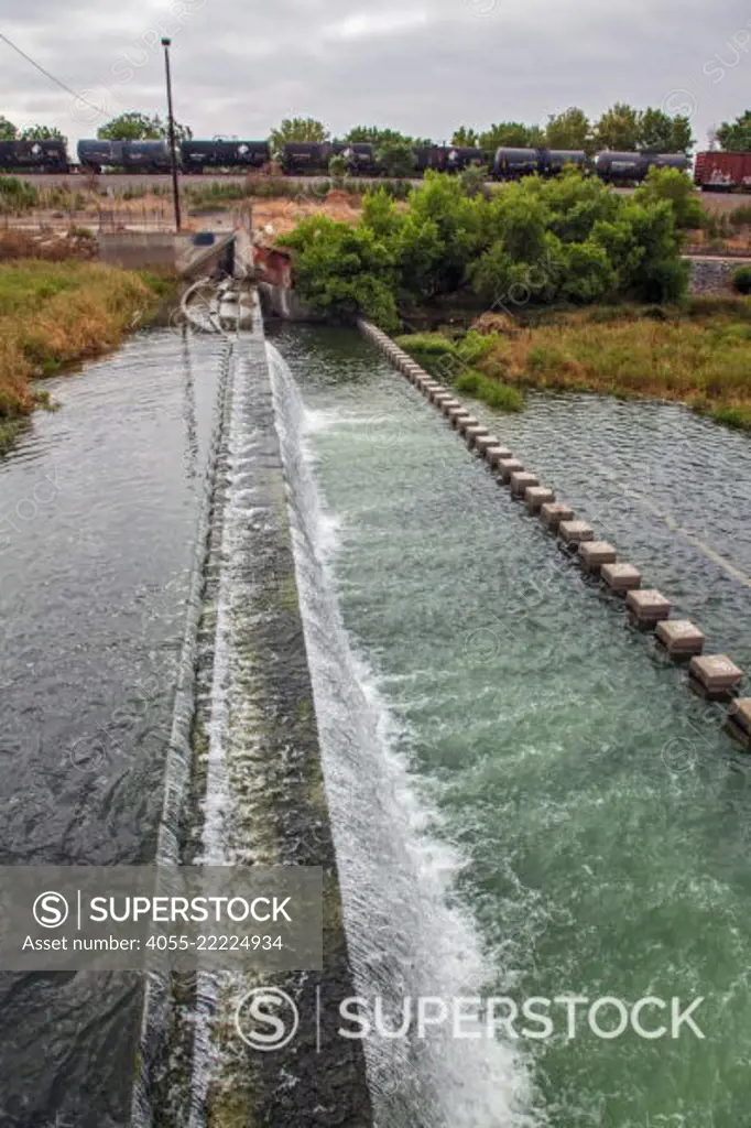 Tertiary-treated recycled water from the San Jose Creek Water Reclamation Plant is diverted to the unlined San Gabriel River for infiltration into the groundwater aquifers below. San Gabriel Spreading Grounds, Water Replenishment District - WRD, Pico Rivera, Los Angeles County