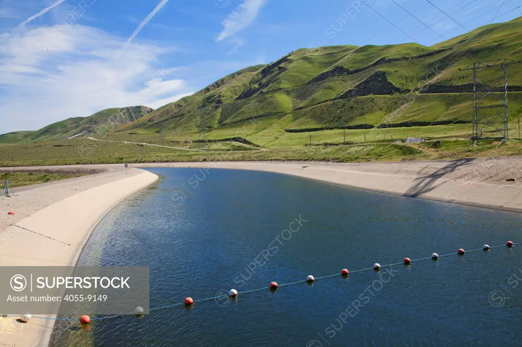 The California Aqueduct is a 444 mile aqueduct, part of the California State Water Project, that carries water from Northern California to Southern California, San Joaquin Valley, Merced County, California, USA