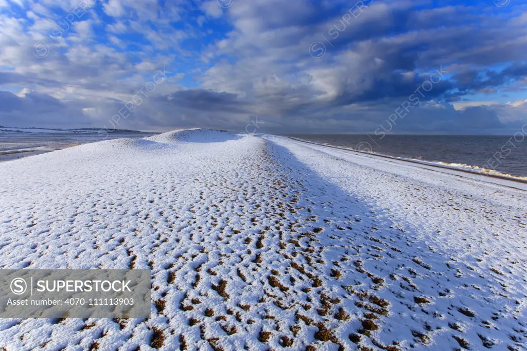 Cley Beach covered in snow, Norfolk. England, UK, January.