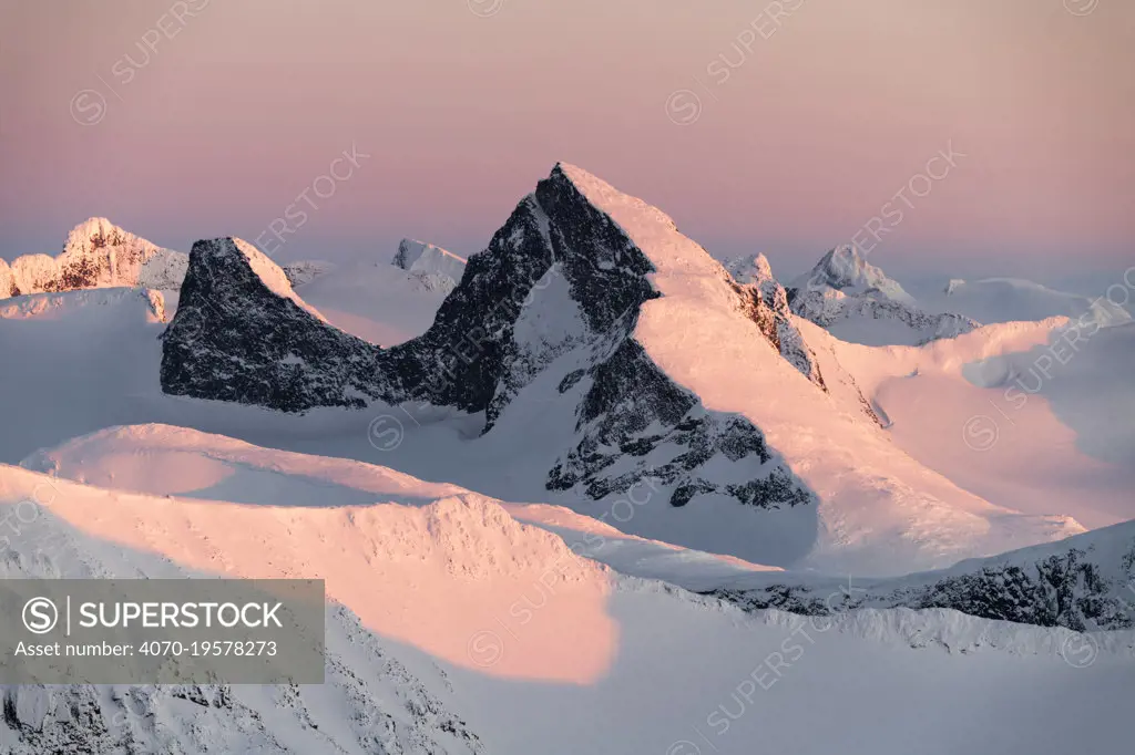 Sunset in the mountains, viewed from Loftet, Jotunheimen National Park, Norway, April.