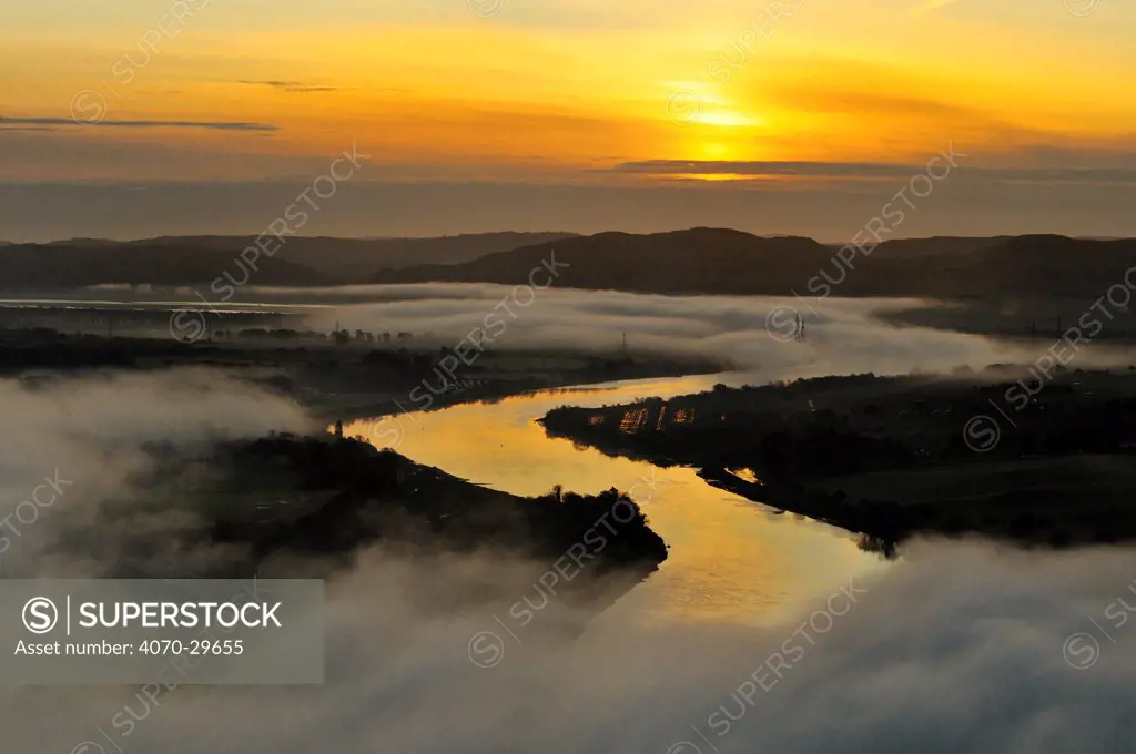 A misty morning view looking down the River Tay in autumn, Kinnoull Hill Woodland Park, Perthshire, Scotland, November 2011.