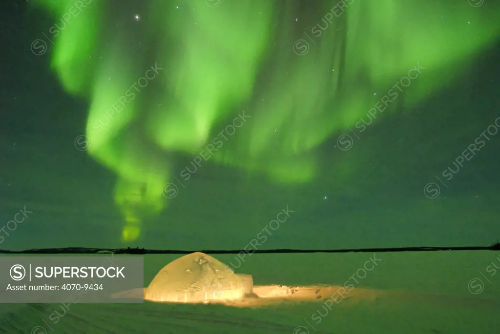 Igloo under northern lights, Northwest Territories, Canada March 2007