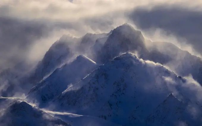 Stormy winter winds over the ridges of Mount Morrison, near Convict Lake and Mammoth, Sierra Nevada, California, USA. January 2016.