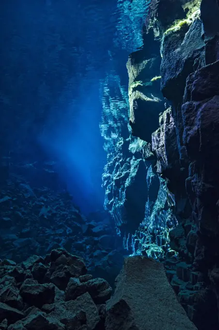 A view down Nikulasargj Canyon, deep fault filled with fresh water in the rift valley between the Eurasian and American tectonic plates at Thingvellir National Park, Iceland. May 2011. In this photo the American plate is on the right and the Eurasian plate is on the left.