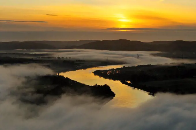 A misty morning view looking down the River Tay in autumn, Kinnoull Hill Woodland Park, Perthshire, Scotland, November 2011.