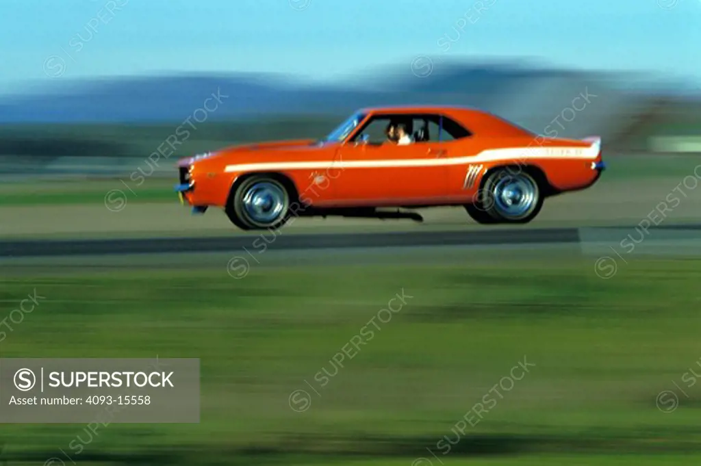 1969 1960s Camaro Z28 Yenko SC orange airborne jumping profile muscle car muscle cars street