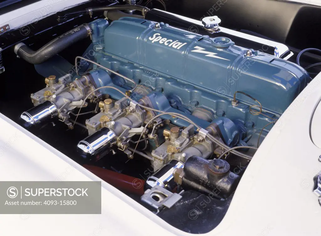 An engine detail of the oldest Corvette in existence. This is a 1953, 1950's Chevrolet Corvette. The engine is a 235 cubic inch inline six cylinder engine.