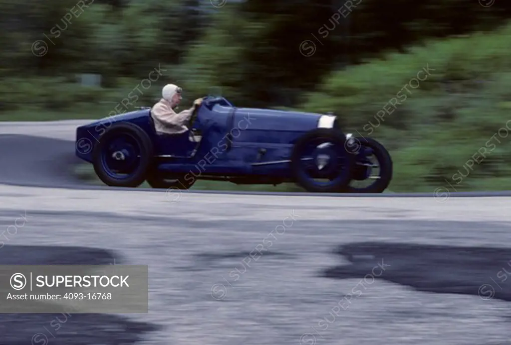 Bugatti Type37 Rene Dreyfus profile action. Ren© Dreyfus (born May 6, 1905 - died August 16, 1993) was a French driver who raced automobiles for 14 years in the 1920s and 1930s, the Golden Era of Grand Prix motor racing.  The Type 35 chassis and body were reused on the Type 37 sports car. Fitted with a new 1.5 L (1496 cc/91 in¬) straight-4 engine, 290 Type 37s were built. This engine was an SOHC 3-valve design and produced 60 hp (44 kW). The same engine went on to be used in the Type 40. The