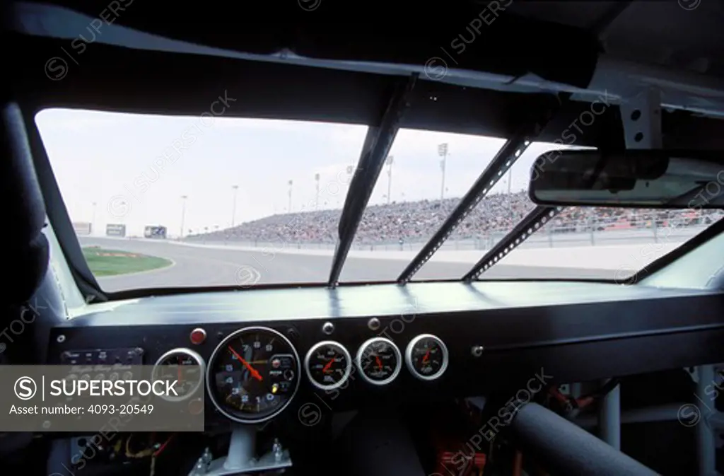 interior detail NASCAR Winston gauges speedometer tachometer dashboard windshield race car