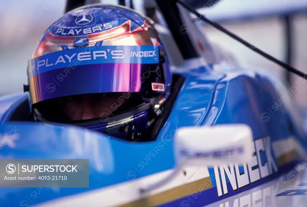 Greg Moore helmet cockpit race car