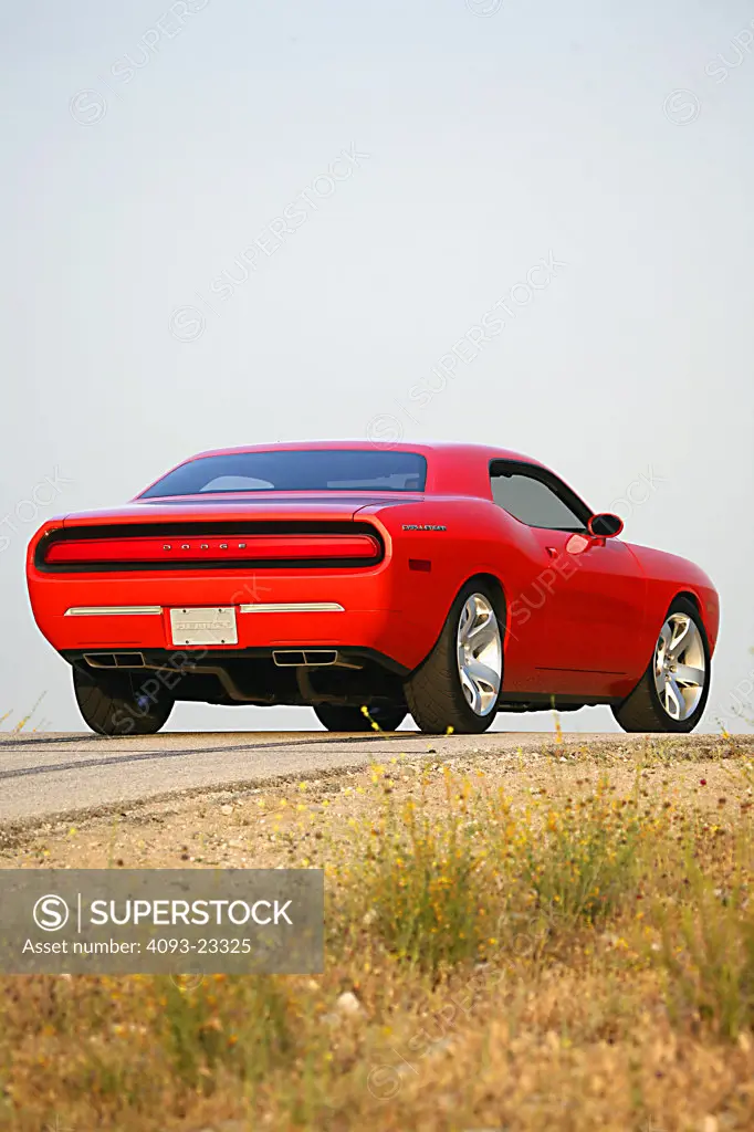 2007 Dodge Challenger Orange on an empty road