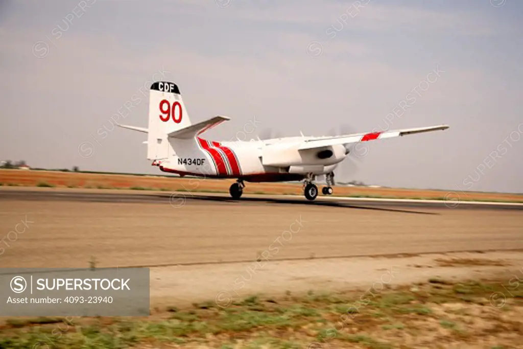 The Grumman S-2 Tracker (previously S2F) was the first purpose-built, single airframe anti-submarine warfare (ASW) aircraft to enter service with the US Navy. They're now primarily used for aerial fire fighting. This one is landing at Porterville, CA airport.