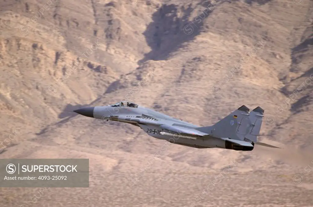 A German Air Force Mig-29 Fulcrum takeoff at Red Flag exercise mission  with ordnance  Nellis AFB  NV.