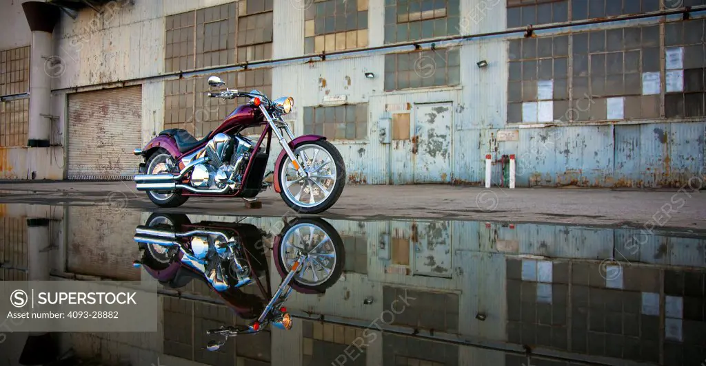 2009 Honda Fury parked outside of industrial building, front 7/8