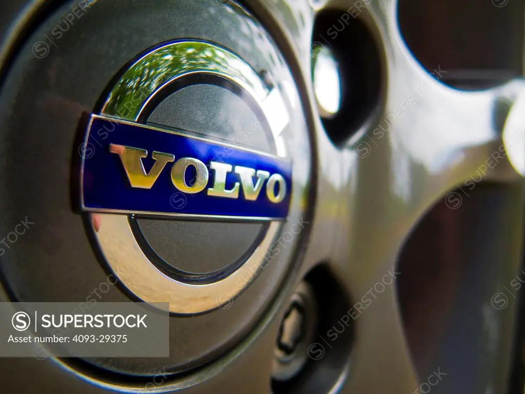 Exterior detail view of a 2012 Volvo S80 showing the badge logo on the wheel rim.