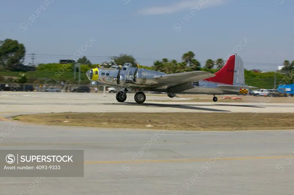 Prop Military Fixed Wing Boeing Aviat Airplanes B-17G Flying Fortress WWII bomber runway taxiing