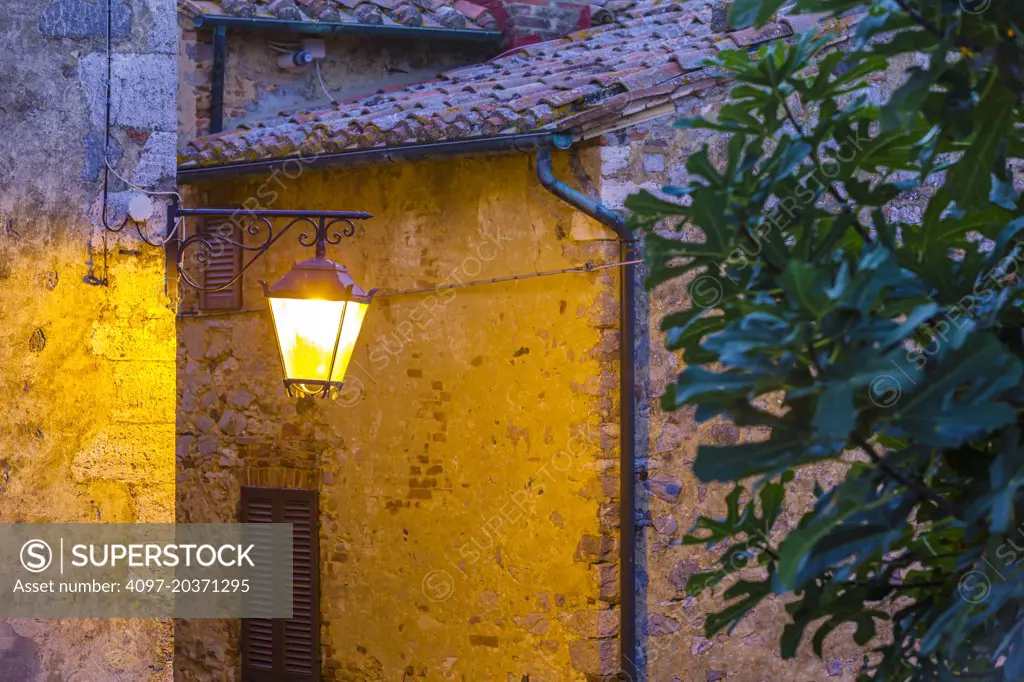 street lamp at dusk in hill town, Tuscany