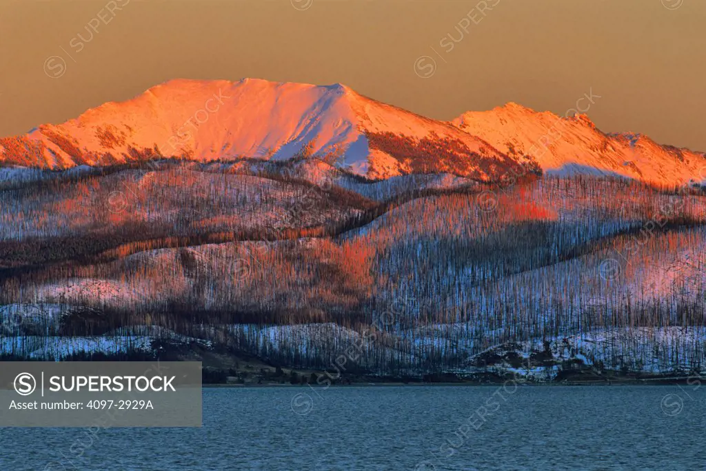 Lake with mountains in the background, Yellowstone Lake, Yellowstone National Park, Wyoming, USA