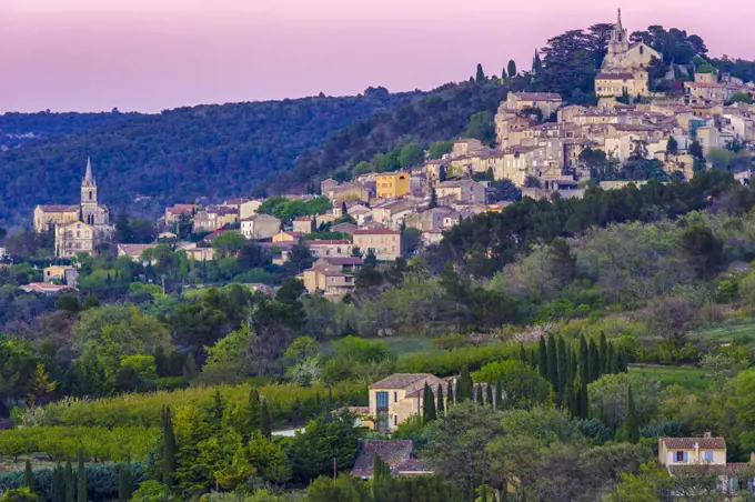 Hill town of Bonnieux in Provence region at dusk, France