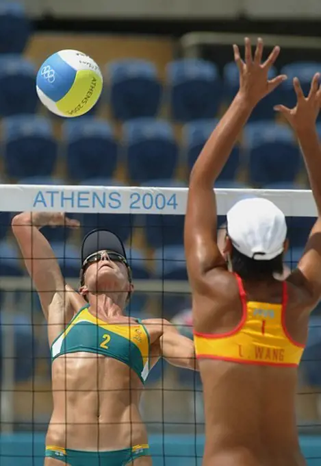 Female volleyball players during an Australia versus China match at the Olympic Games, Athens, Greece, 16 August 2004.