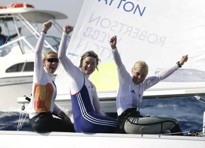 Women's Yngling crew Shirley Robertson, Sarah Webb and Sarah Ayton celebrate after winning Great Britain's first Gold Medal at the Olympic Games, Athens, 19 August 2004.