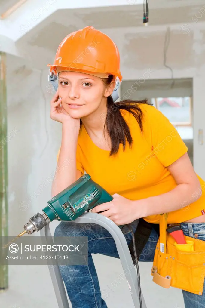 Young woman on a ladder.