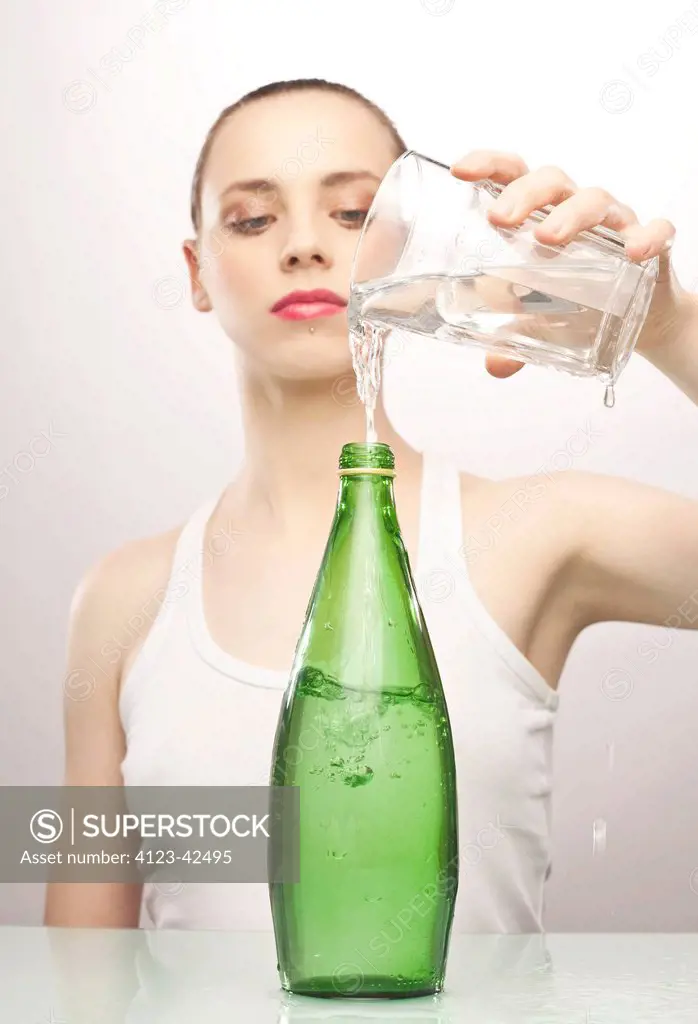 Woman pouring water.