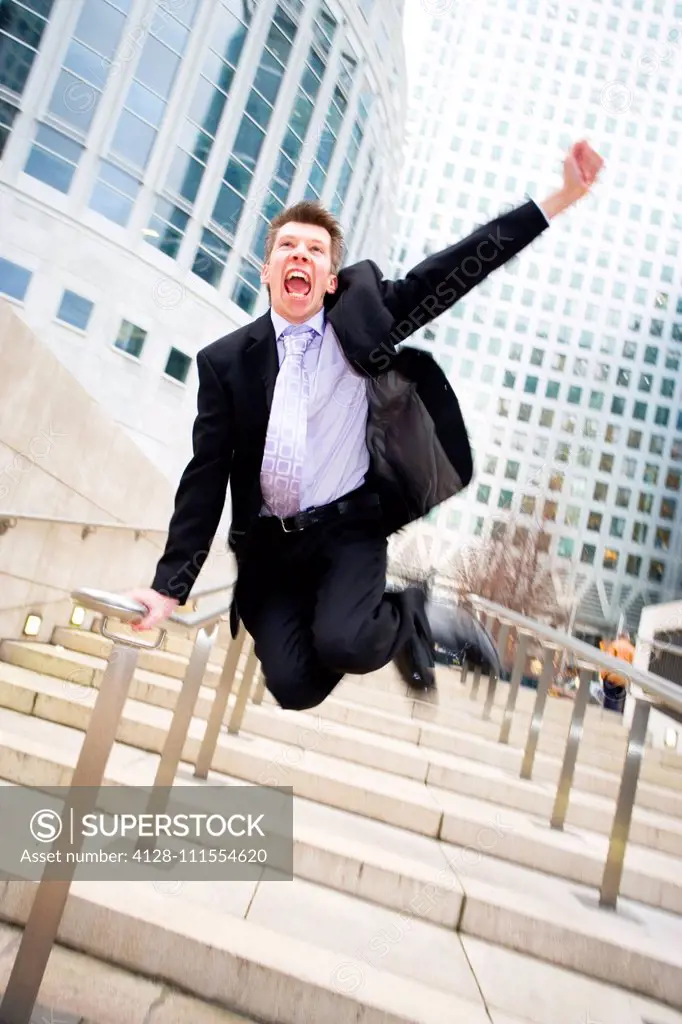 Businessman jumping for joy