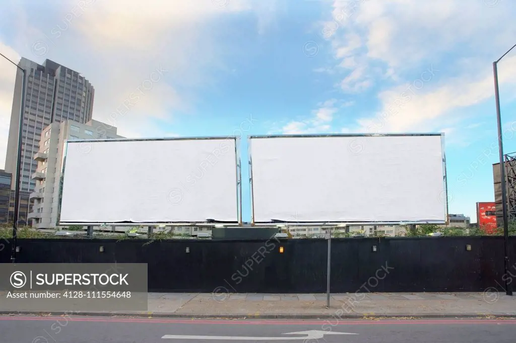 Two blank billboards